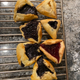 Illustration for article titled Hamantaschen are a hilariously weird Purim treat, but hey, it’s tradition